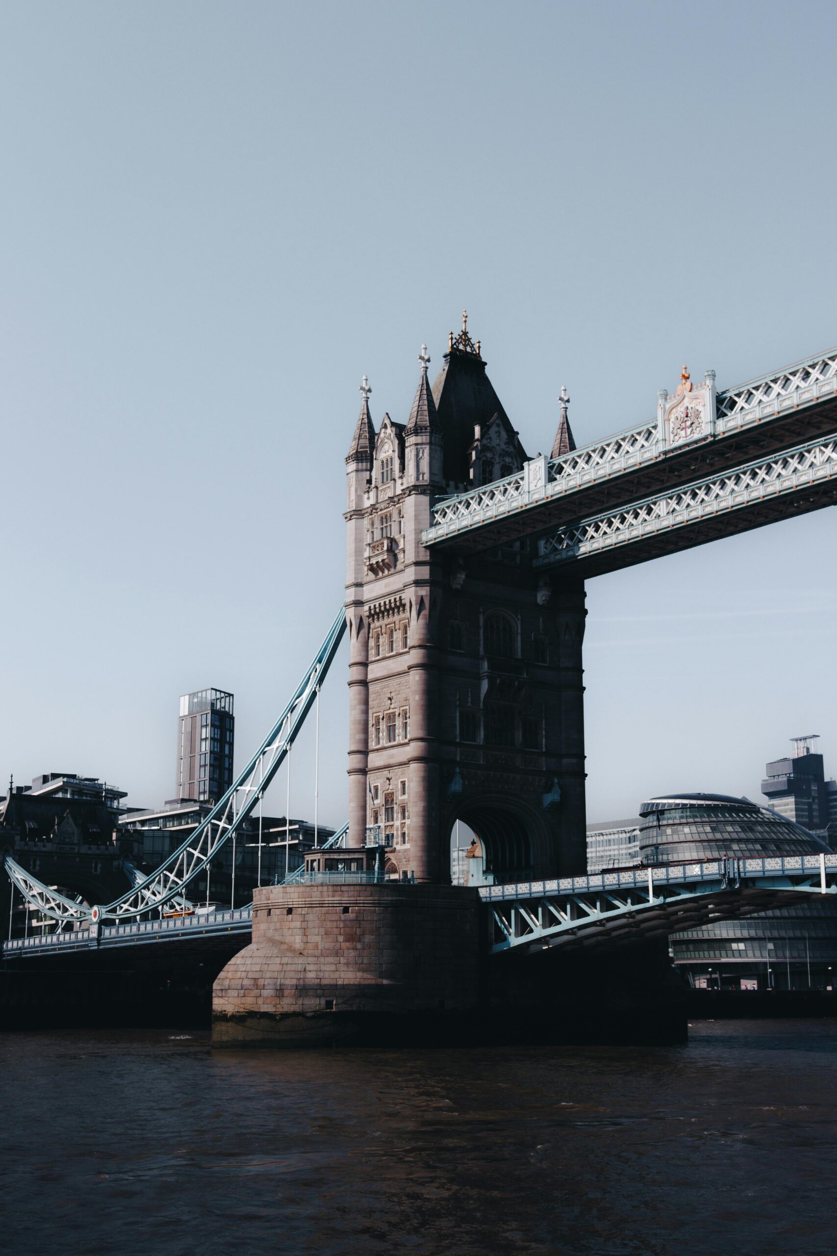 Iconic Tower Bridge spanning the River Thames, highlighting London's historic architecture.